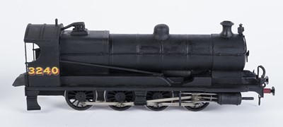 Lot 91 - A metal kit-built 0-gauge 0-8-0 locomotive and six-wheel tender