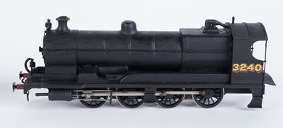 Lot 91 - A metal kit-built 0-gauge 0-8-0 locomotive and six-wheel tender