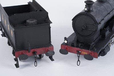Lot 91 - A metal kit-built 0-gauge 0-8-0 locomotive and six-wheel tender