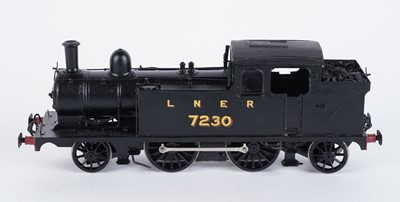Lot 98 - A metal kit-built 0-gauge 2-4-2 locomotive