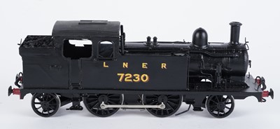 Lot 98 - A metal kit-built 0-gauge 2-4-2 locomotive