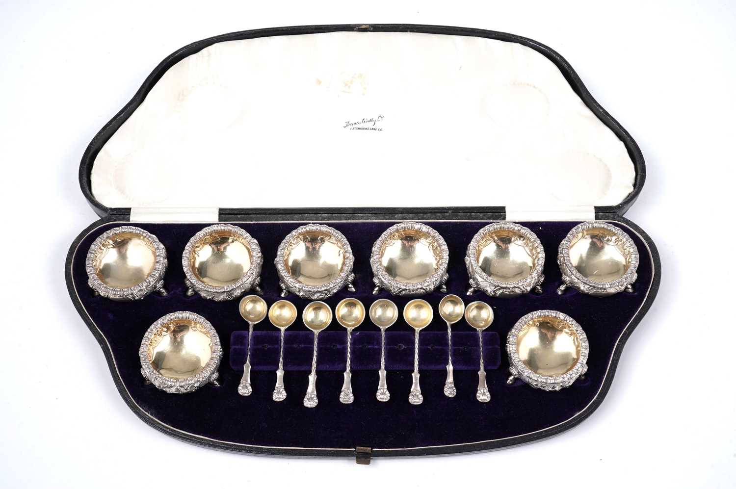 Lot 1497 - A Victorian cased set of eight small salts with matching spoons