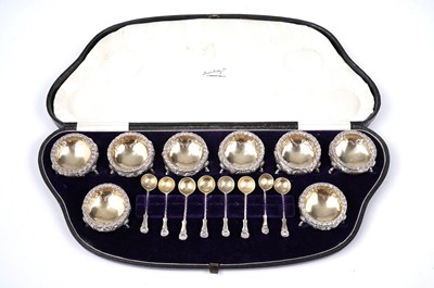 Lot 1497 - A Victorian cased set of eight small salts with matching spoons