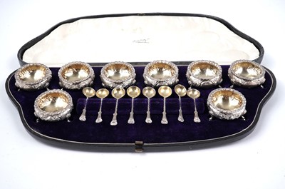 Lot 1497 - A Victorian cased set of eight small salts with matching spoons