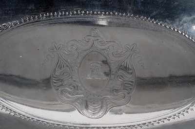 Lot 1498 - A George III swing-handled cake basket