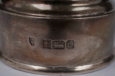Lot 1339 - An Elizabeth II tea strainer and a peppermill