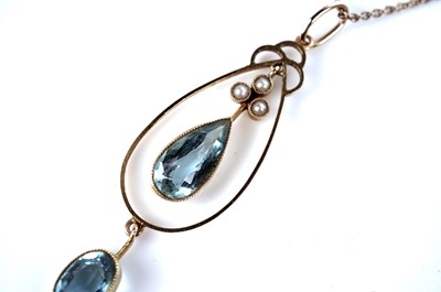 Lot 1150 - An Edwardian aquamarine and seed pearl pendant necklace