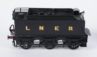 Lot 148 - A metal kit-built 0-gauge 0-6-0 locomotive and six-wheel tender