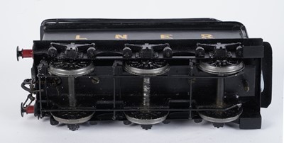 Lot 148 - A metal kit-built 0-gauge 0-6-0 locomotive and six-wheel tender