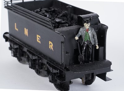 Lot 148 - A metal kit-built 0-gauge 0-6-0 locomotive and six-wheel tender