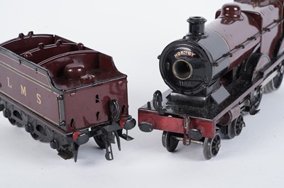 Lot 174 - A Hornby 0-gauge 4-4-0 locomotive and six-wheel tender