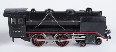 Lot 37 - A Marklin 0-gauge 4-4-0 locomotive and six-wheel tender