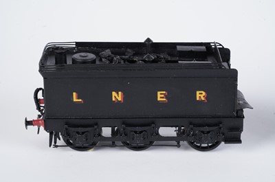 Lot 206 - A metal kit-built 0-gauge 4-4-0 locomotive and six-wheel tender