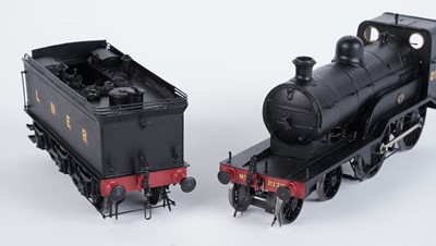 Lot 206 - A metal kit-built 0-gauge 4-4-0 locomotive and six-wheel tender