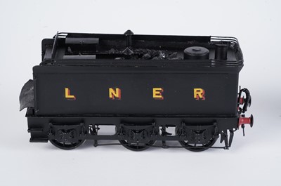 Lot 206 - A metal kit-built 0-gauge 4-4-0 locomotive and six-wheel tender