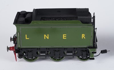 Lot 238 - A metal kit-built 0-gauge 4-4-0 locomotive and six-wheel tender