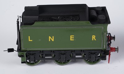 Lot 238 - A metal kit-built 0-gauge 4-4-0 locomotive and six-wheel tender