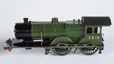 Lot 238 - A metal kit-built 0-gauge 4-4-0 locomotive and six-wheel tender
