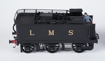 Lot 240 - A metal kit-built 0-gauge 2-4-0 locomotive and six-wheel tender