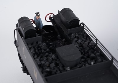 Lot 240 - A metal kit-built 0-gauge 2-4-0 locomotive and six-wheel tender