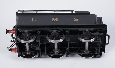 Lot 240 - A metal kit-built 0-gauge 2-4-0 locomotive and six-wheel tender