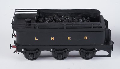 Lot 252 - A metal kit-built 0-gauge 0-6-0 locomotive and six-wheel tender
