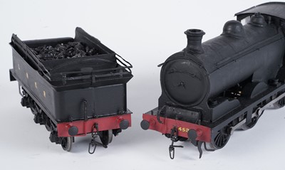 Lot 252 - A metal kit-built 0-gauge 0-6-0 locomotive and six-wheel tender