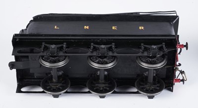 Lot 252 - A metal kit-built 0-gauge 0-6-0 locomotive and six-wheel tender