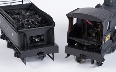 Lot 252 - A metal kit-built 0-gauge 0-6-0 locomotive and six-wheel tender