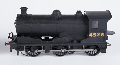 Lot 252 - A metal kit-built 0-gauge 0-6-0 locomotive and six-wheel tender