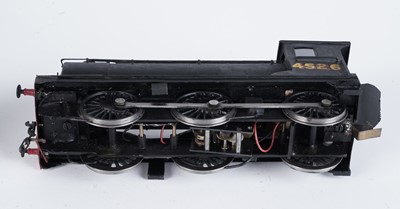 Lot 252 - A metal kit-built 0-gauge 0-6-0 locomotive and six-wheel tender
