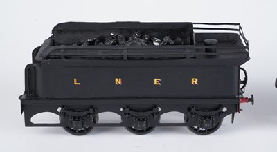 Lot 252 - A metal kit-built 0-gauge 0-6-0 locomotive and six-wheel tender
