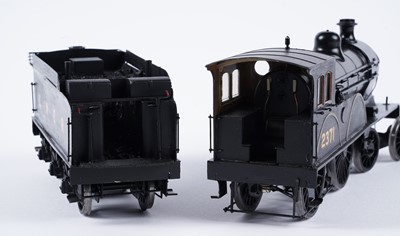 Lot 256 - A metal kit-built 0-gauge 4-4-0 locomotive and six-wheel tender