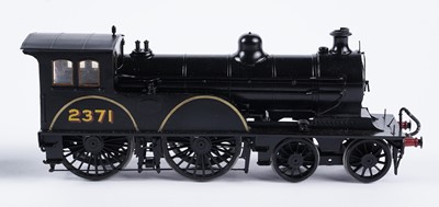Lot 256 - A metal kit-built 0-gauge 4-4-0 locomotive and six-wheel tender