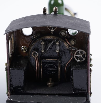 Lot 259 - A metal kit-built 0-gauge 4-2-2 locomotive and six-wheel tender