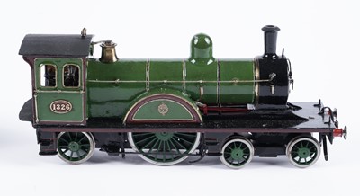 Lot 259 - A metal kit-built 0-gauge 4-2-2 locomotive and six-wheel tender