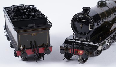 Lot 260 - A metal kit-built 0-gauge 4-4-2 locomotive and six-wheel tender