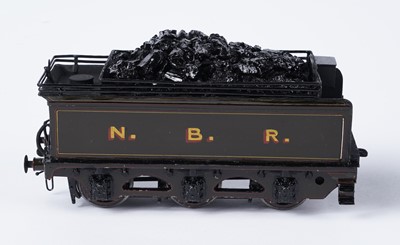 Lot 260 - A metal kit-built 0-gauge 4-4-2 locomotive and six-wheel tender