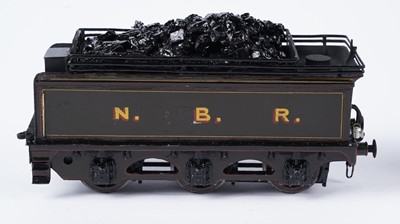 Lot 260 - A metal kit-built 0-gauge 4-4-2 locomotive and six-wheel tender