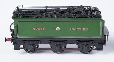Lot 264 - A metal kit-built 0-gauge 4-4-0 locomotive and six-wheel tender