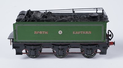 Lot 264 - A metal kit-built 0-gauge 4-4-0 locomotive and six-wheel tender