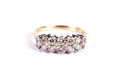 Lot 517 - A diamond dress ring