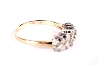 Lot 517 - A diamond dress ring