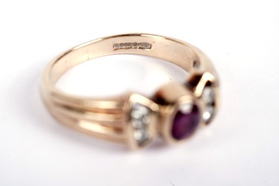 Lot 519 - A ruby and diamond dress ring