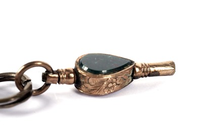 Lot 543 - A Victorian bloodstone and carnelian swivel fob; and a watch key
