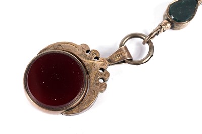 Lot 543 - A Victorian bloodstone and carnelian swivel fob; and a watch key