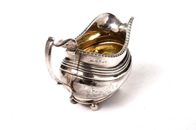 Lot 1429 - A late George III silver cream jug