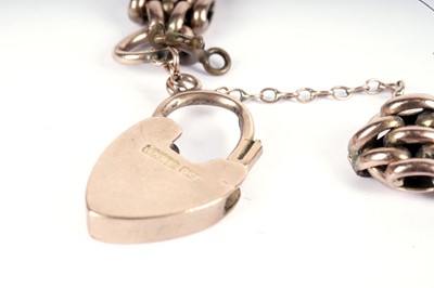 Lot 574 - A rose gold bracelet; and a bar brooch