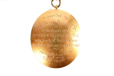 Lot 578 - An Edwardian 15ct yellow gold Masonic jewel; and a silver Masonic medal