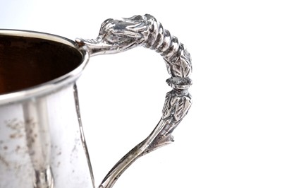 Lot 1352 - A pair of Elizabeth II and one other silver mugs